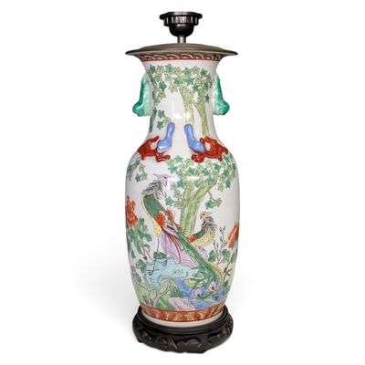 an image of a vase with birds and flowers painted on it