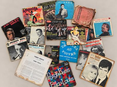 an image of a pile of old music books on a table