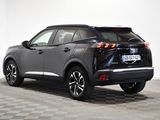 the rear view of a black 2020 toyota c - hr