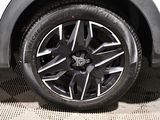 a close up view of a tire on a car