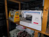 two sewing machines sitting on a shelf in a room