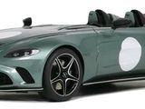 the aston car is green and has a white stripe on the side