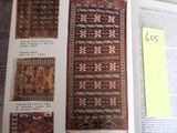 an open book with a picture of a rug on top of it