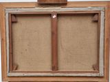 an old picture frame with a piece of wood on top of it