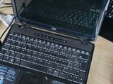 two laptops that are sitting on a table