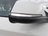 a close up of a car ' s side mirror on the side of the car