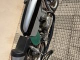 a motorcycle parked on the side of the street