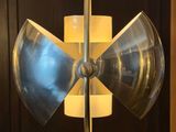 a lamp that is hanging from the ceiling in a room