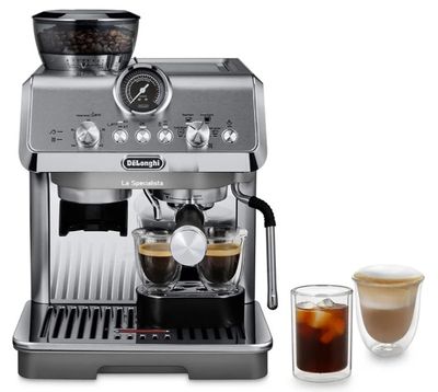 une image d'une machine à café avec une tasse de café à côté d'elle