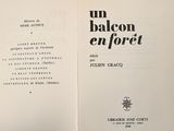 an open book with a black and white image on it