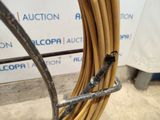 an image of a close up of a hose on a stand