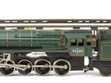a toy train that is sitting on the tracks