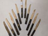 six different types of wood carving knives are arranged in a circle