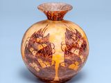 a vase with a design on it on a blue background