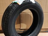tires are stacked on top of a cardboard box in a warehouse
