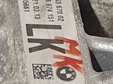 a close up of a metal object with a tag on it