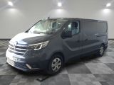 a picture of a grey van parked on a checkered floor