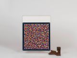 a picture of a sprinkle tray with a sprinkles in it