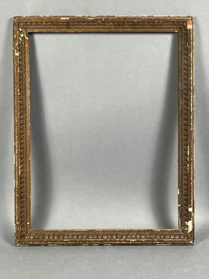 a pair of antique gold picture frames with a white background