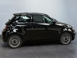 an image of a smart car parked in a showroom
