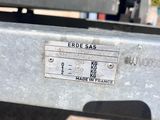 a close up of a metal sign on the back of a truck