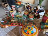 a glass table with a bunch of toy figurines on it