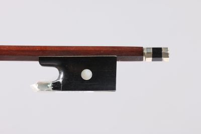 a close up of a violin bow on a white background
