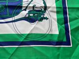 a green and white scarf with a picture of a car on it