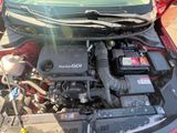 the engine of a car with its hood open and the hood up