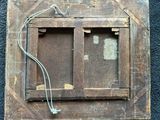 a picture of a picture of a window with wires attached to it