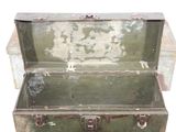 an old green trunk with a metal latch on it