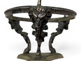 an image of a bronze statue of a bull with horns on it ' s head