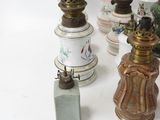 many different vases that are sitting on a table