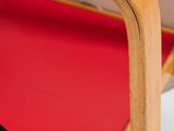 an image of a close up of a table with a red table top