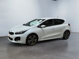 a white car in a white room with a black floor