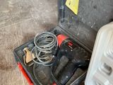 a tool box with tools in it sitting on the floor