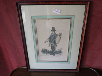 une vieille photo encadrée représentant un homme avec un chapeau et une canne
