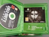 a green case with a cd inside of it