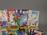 a lot of comic books sitting on a table