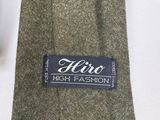 a close up of a tie with a label on it