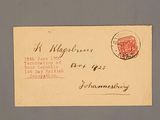 une carte postale sur laquelle figure l'image d'une rose