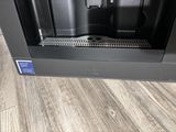 a coffee machine that is sitting on the floor