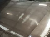a car that has been cleaned and is sitting in the garage