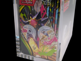 a clear box with a bunch of pens in it