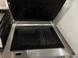 a grill that is sitting on top of a counter
