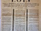 an old newspaper with a large piece of paper on it