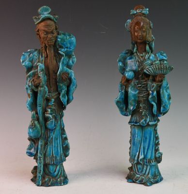 pair of antique chinese figurines of a man and a woman