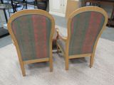 two chairs that are sitting next to each other on the floor