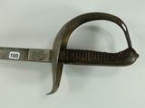 a very old sword that is on display on the wall