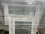 a picture of a picture frame wrapped in plastic on a pallet